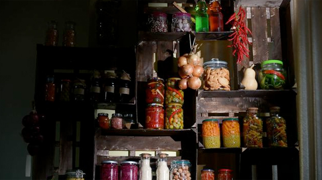 storage shelves with jarred foods