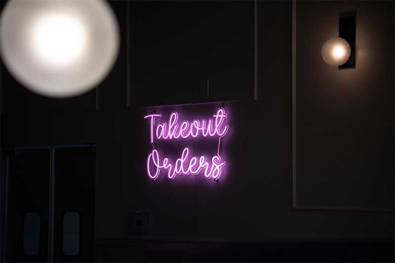 neon sign with dim lighting